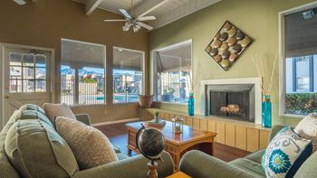 Riverstone clubhouse with nice lounging area with a ceiling fan